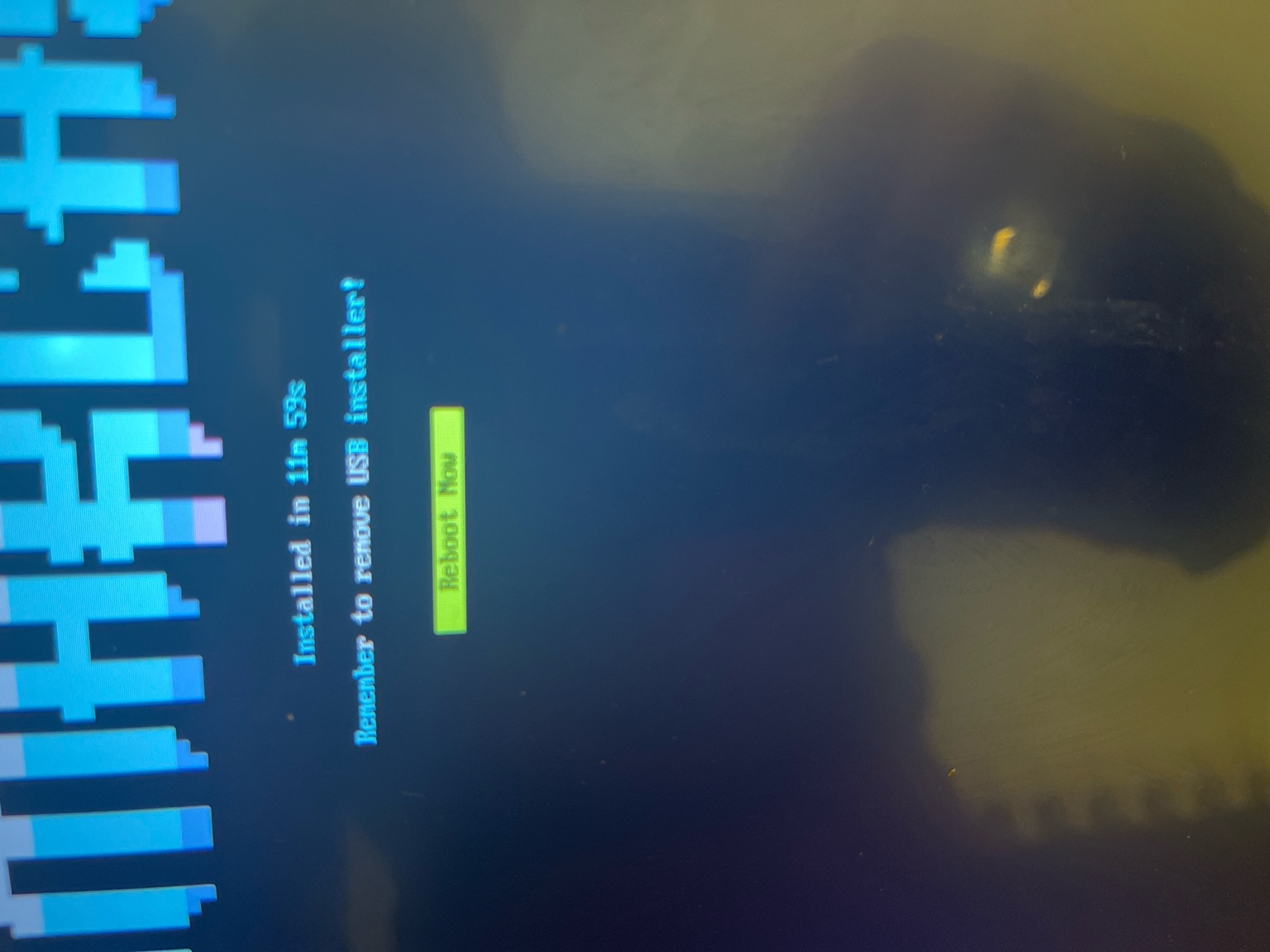 Omarchy installation screen showing install finished in about 12 minutes